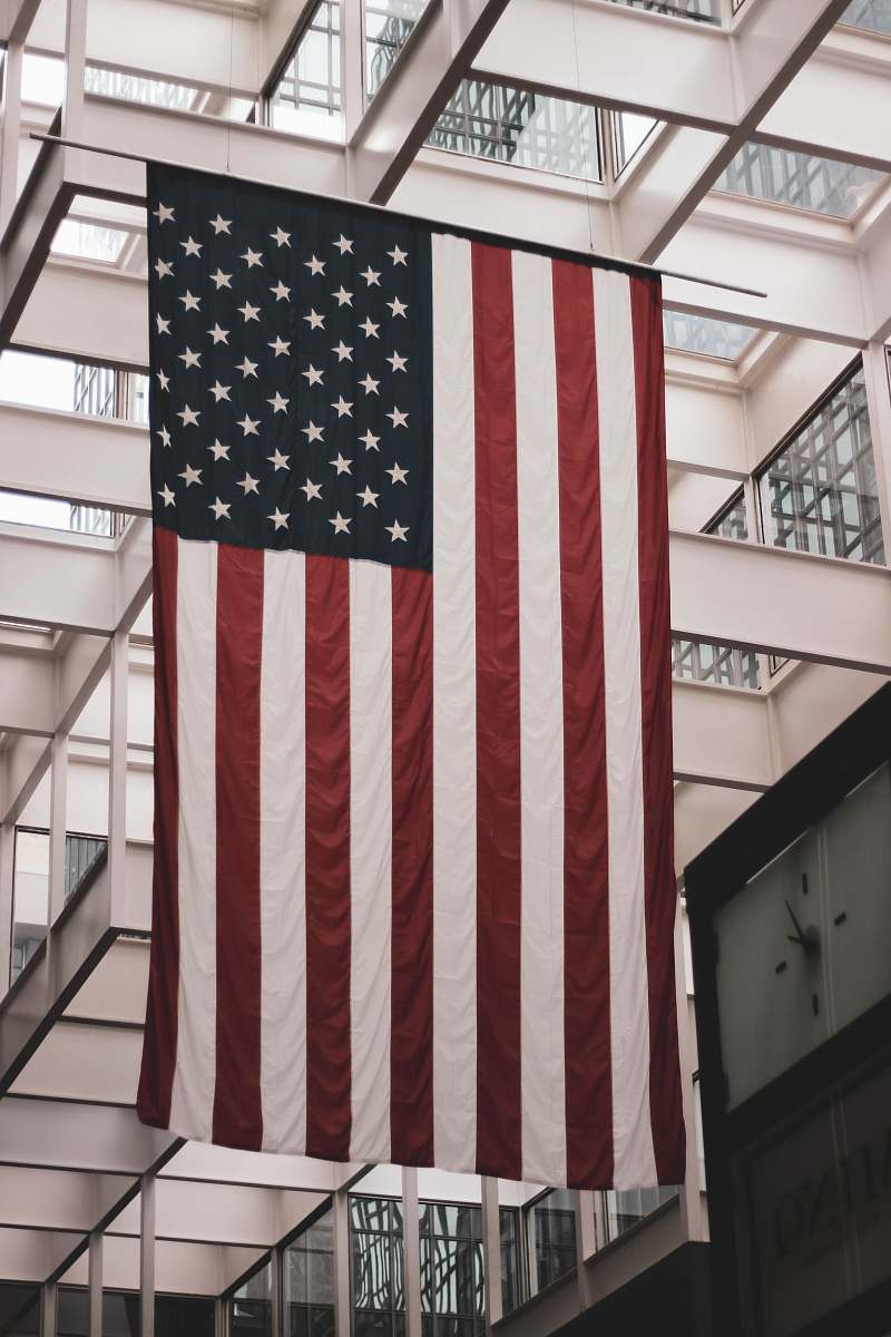 flag USA flag hanging on metal tube symbol
